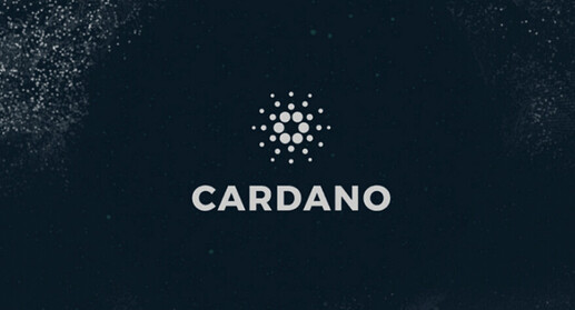 The image features the logo of "Cardano" on a dark background with a stylised geometric design above the text. (Captioned by AI)
